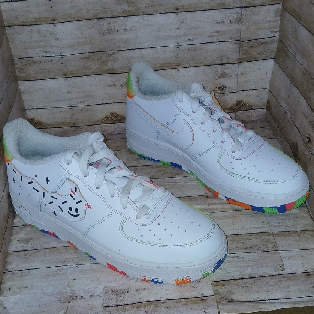 Nike Kids White Low-Top Sneakers with Multicolor Sole Accents